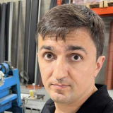 Viktor Mykhailov, managing partner at MRoof metal roofing.